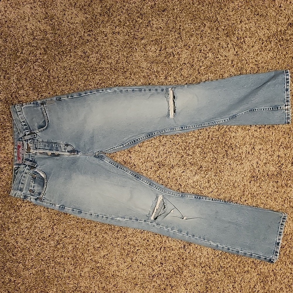 90s acid wash jeans, Silvers, button fly, with holes in knees bilat, sz 27/30